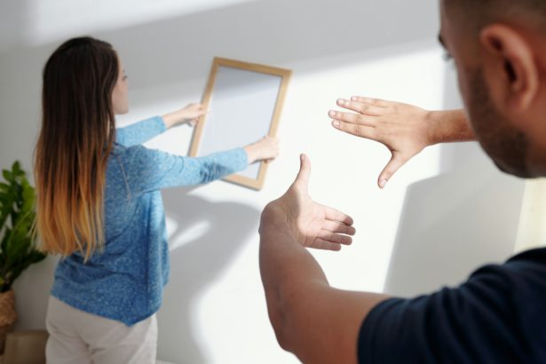 Couple Decorating Apartment