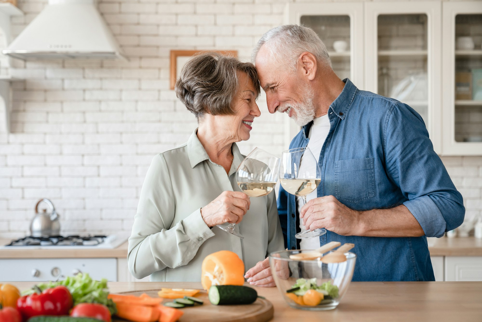 Quality time - love language. Caucasian senior couple grandparents celebrating special event
