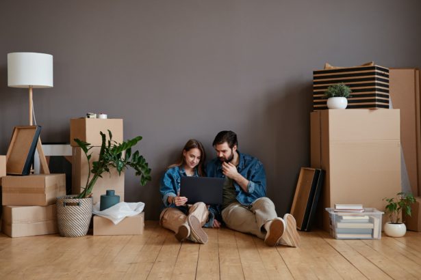 Young Couple Using Laptop